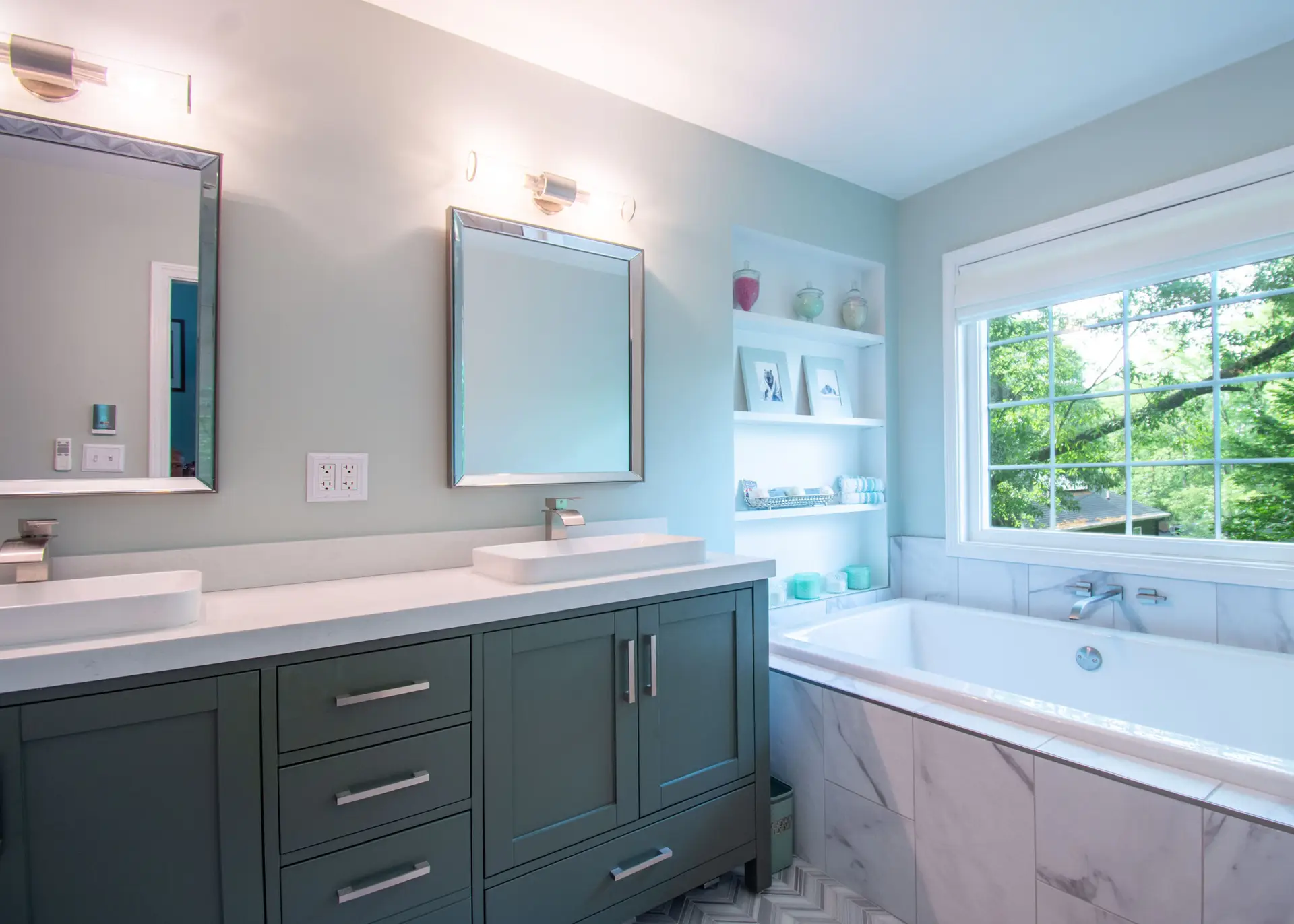 KD Pro Handyman modern bathroom remodel with blue vanity in Atlanta home