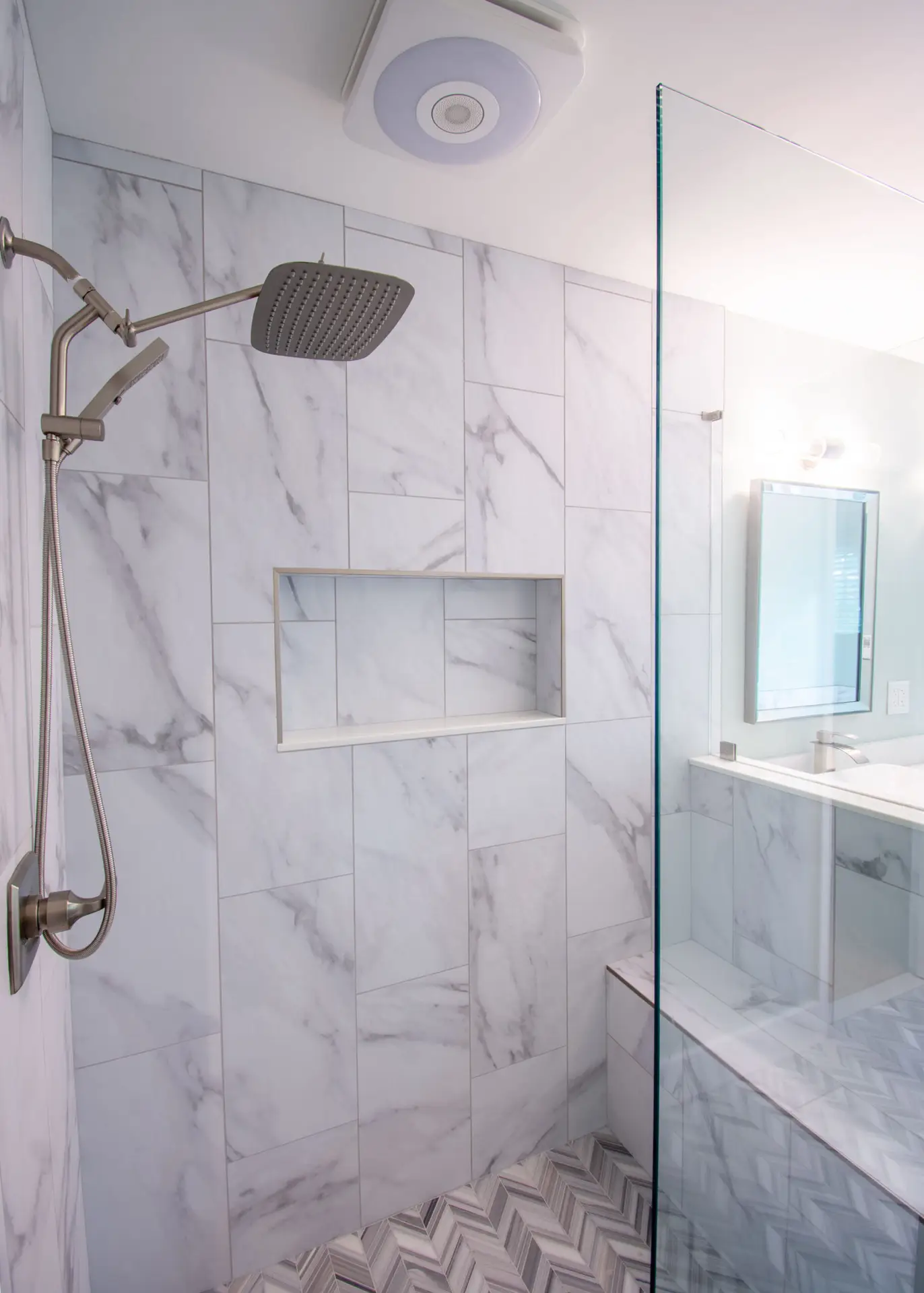 Elegant marble shower design by licensed contractor KD Pro Handyman