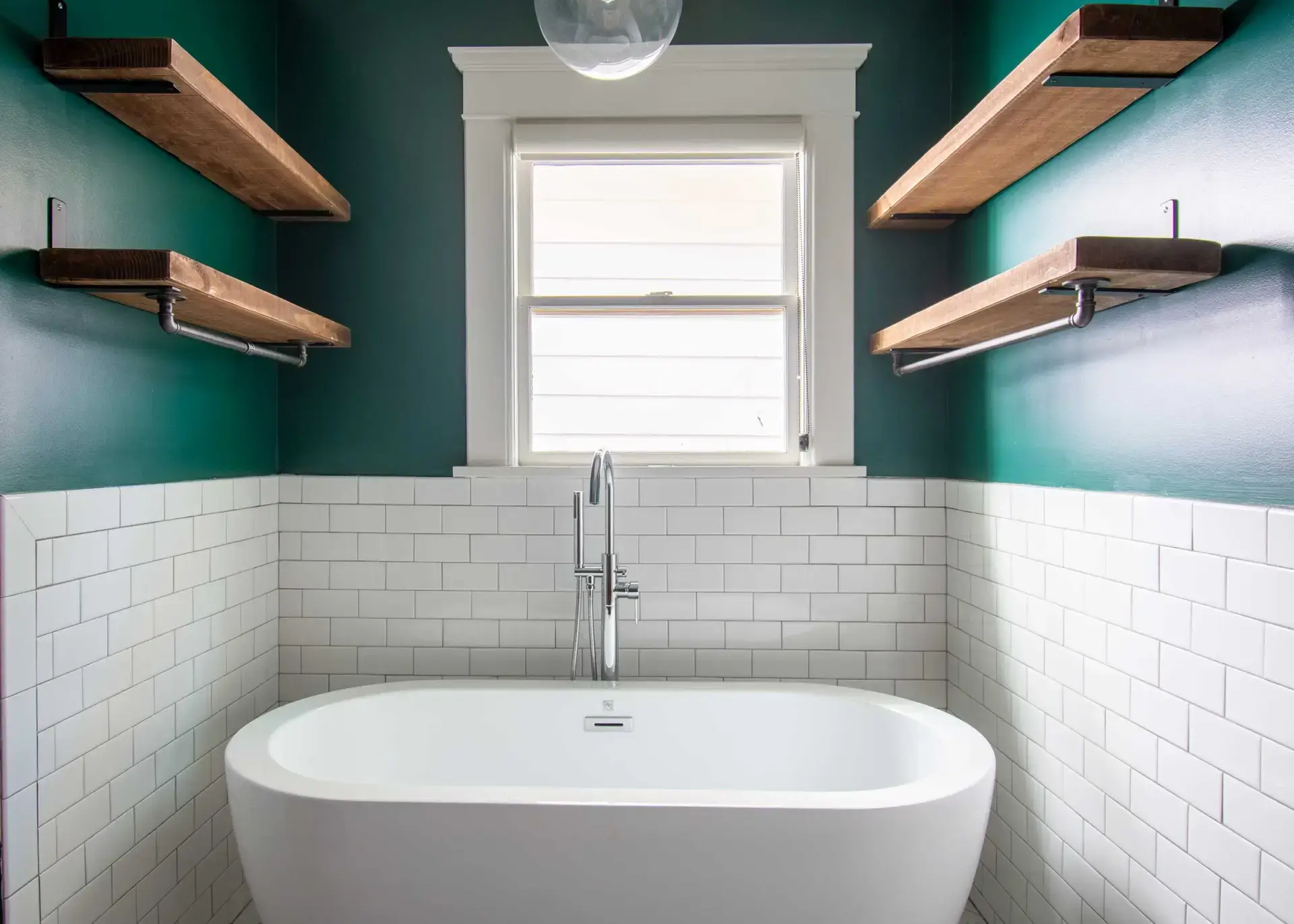Spa-style bathroom with freestanding tub by KD Pro Handyman Atlanta