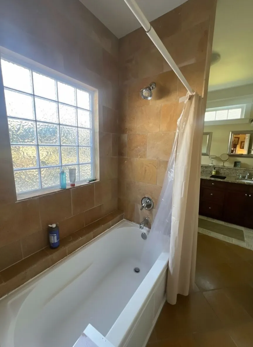 Outdated bathroom before shower upgrade