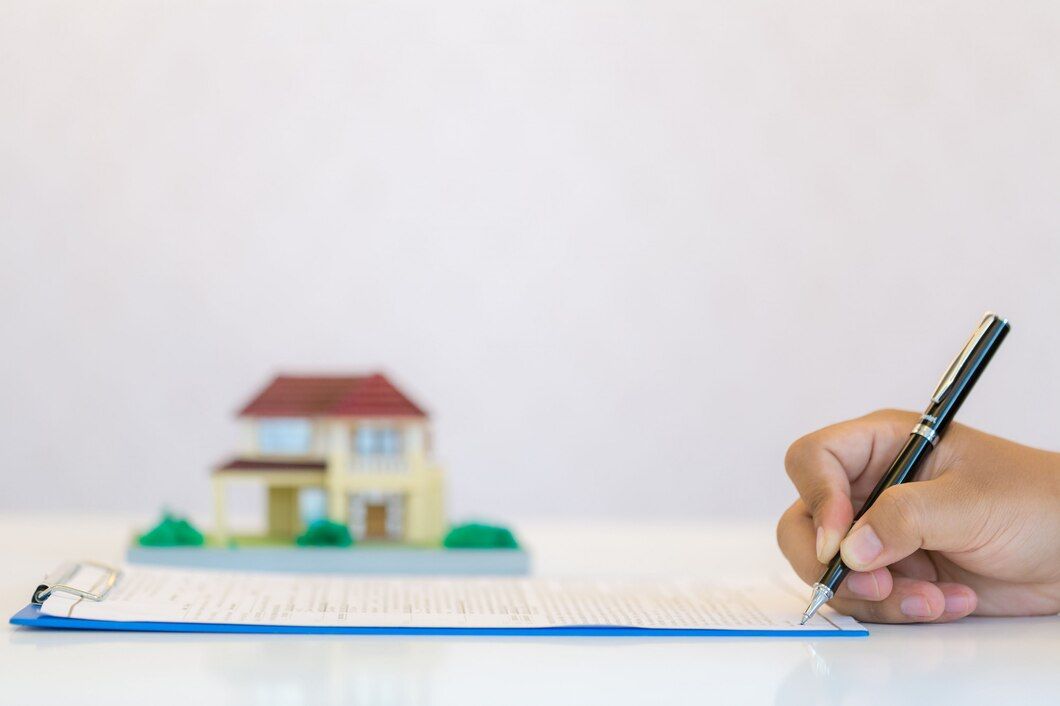 Hand filling out a rental turnover estimate document in Atlanta